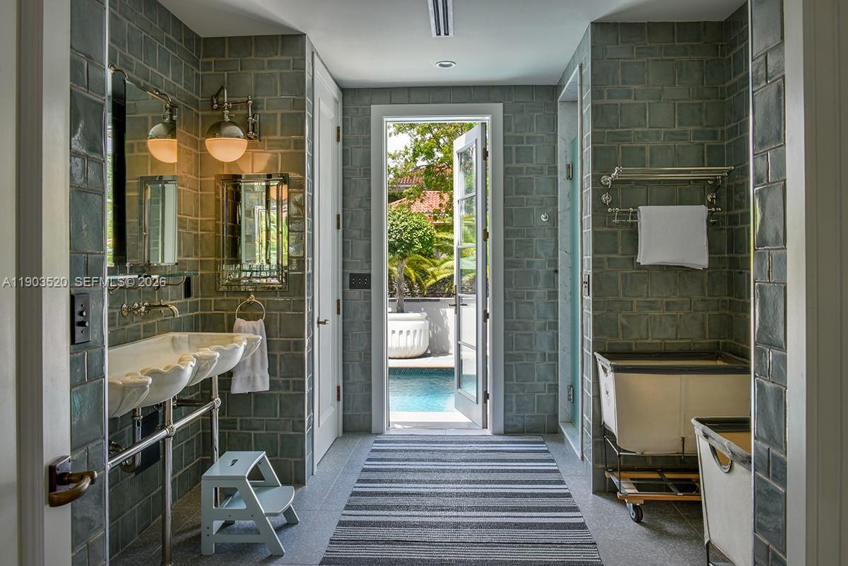 5771 Southwest 94th Street Pinecrest, FL 33156 - Photo 39 of 47 a bathroom with a shower