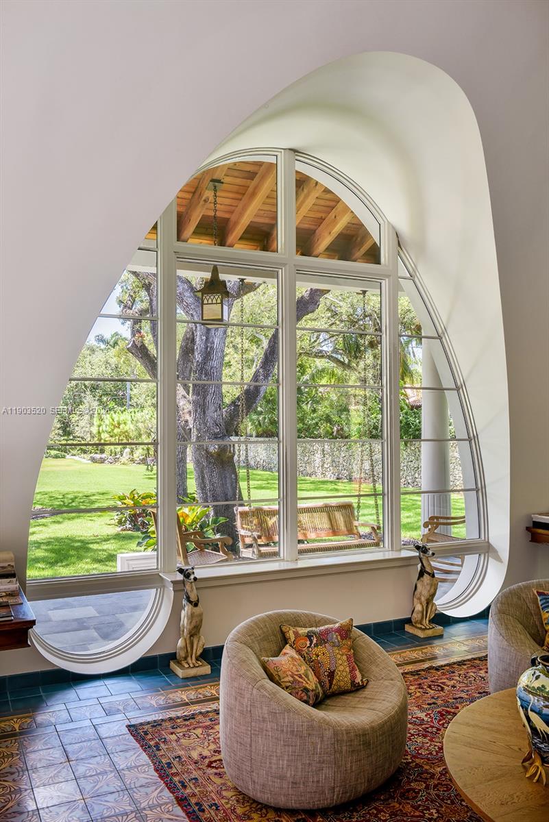 5771 Southwest 94th Street Pinecrest, FL 33156 - Photo 46 of 47 a room with furniture and a window