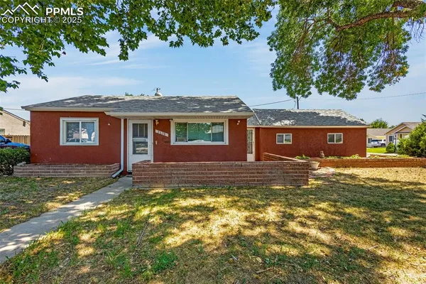 a view of a house with a swimming pool