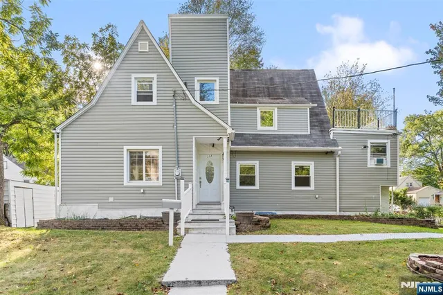 a view of a house with a swimming pool