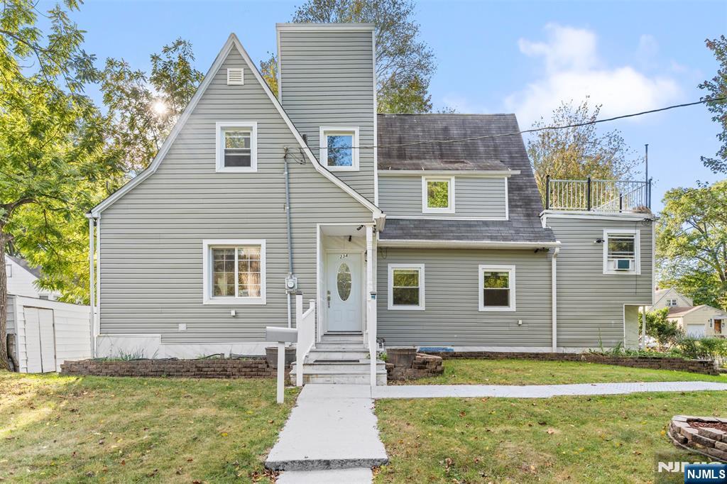 a view of a house with a swimming pool