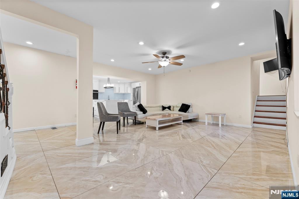 234 Liberty Road Teaneck, NJ 07666 - Photo 11 of 42 a view of a livingroom with furniture and a flat screen tv