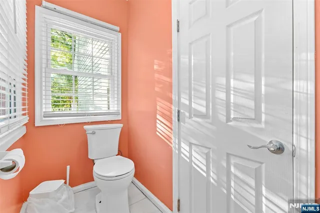 a bathroom with a toilet sink and tub