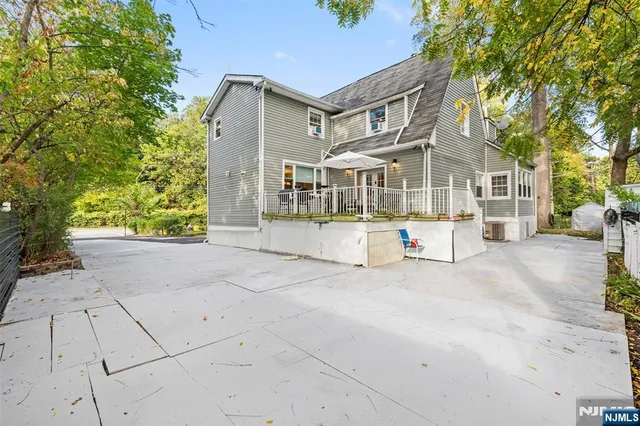 a view of backyard and tree