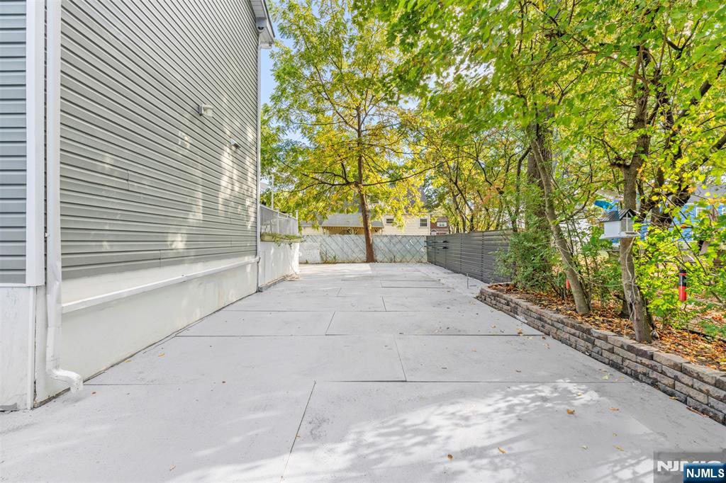 234 Liberty Road Teaneck, NJ 07666 - Photo 37 of 42 a view of backyard and tree