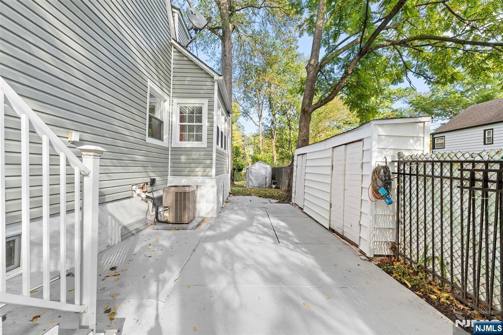 234 Liberty Road Teaneck, NJ 07666 - Photo 41 of 42 a view of a back yard of the house