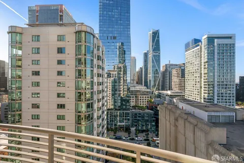 a view of a city with tall buildings