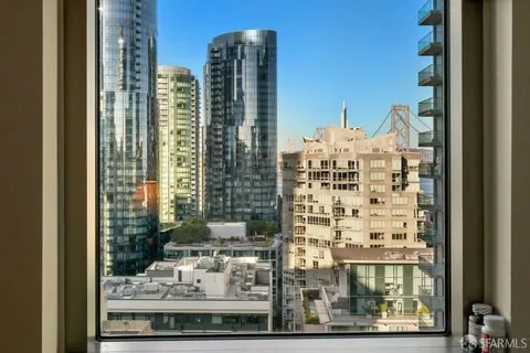 a view of a city with tall buildings