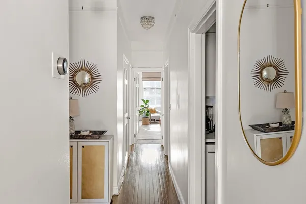 a view of a storage & utility room with two washing machine