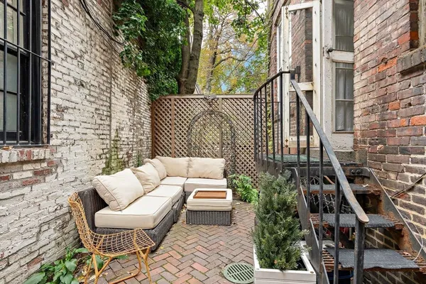 a building outdoor space with patio furniture