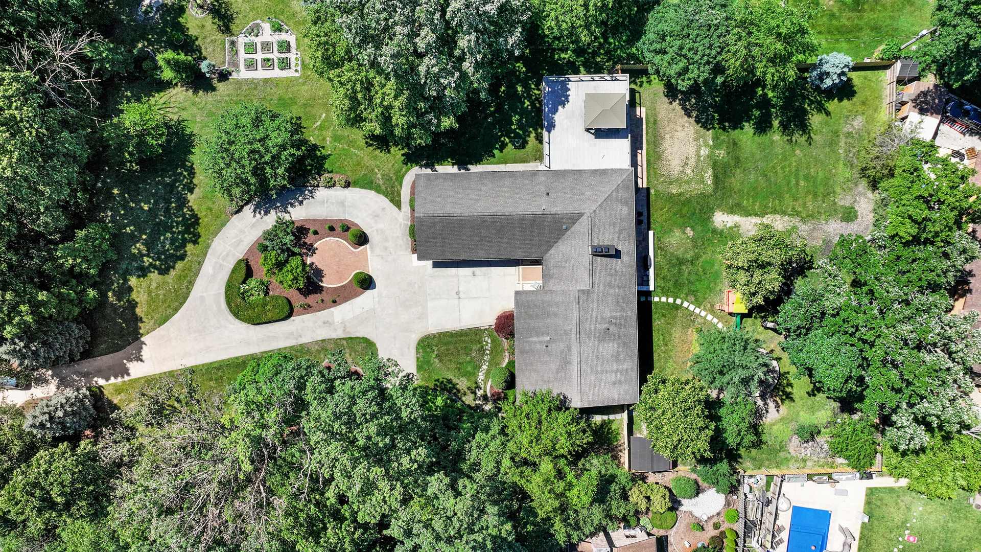 5N750 Medinah Road Medinah, IL 60157 - Photo 49 of 53 an aerial view of a house with outdoor space and trees all around