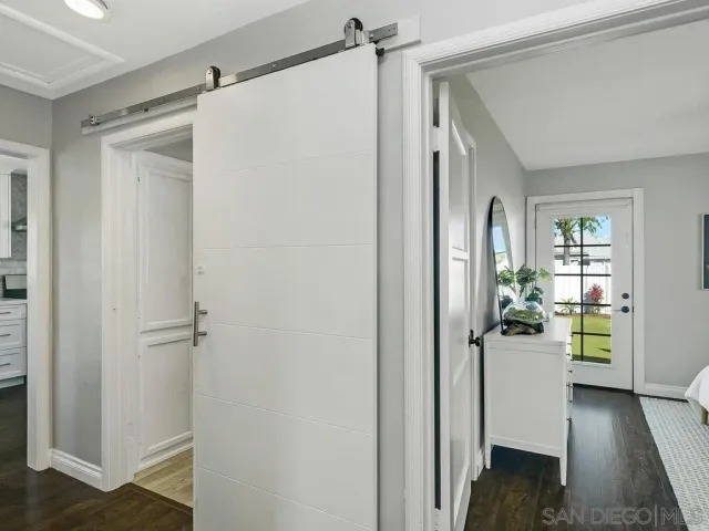 a view of a walk in closet and bedroom
