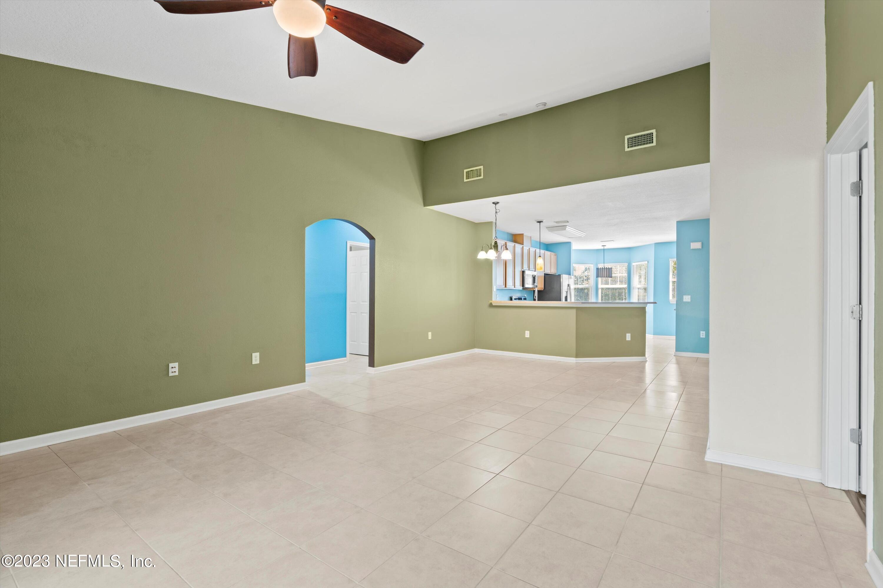 5663 Greenland Road, Unit 1005 Jacksonville, FL 32258 - Photo 11 of 30 a view of a livingroom with a fireplace