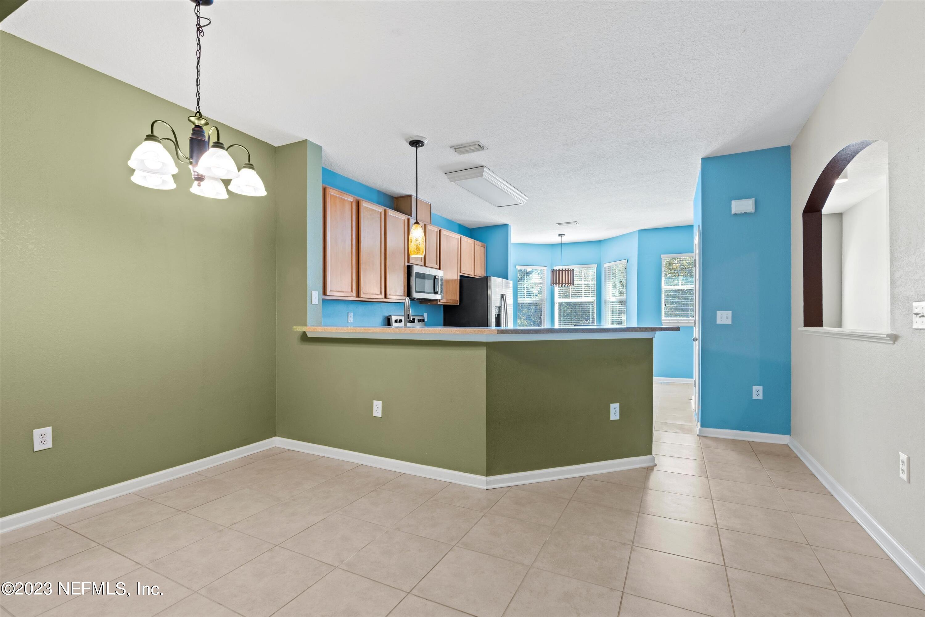 5663 Greenland Road, Unit 1005 Jacksonville, FL 32258 - Photo 12 of 30 a view of a kitchen and a window