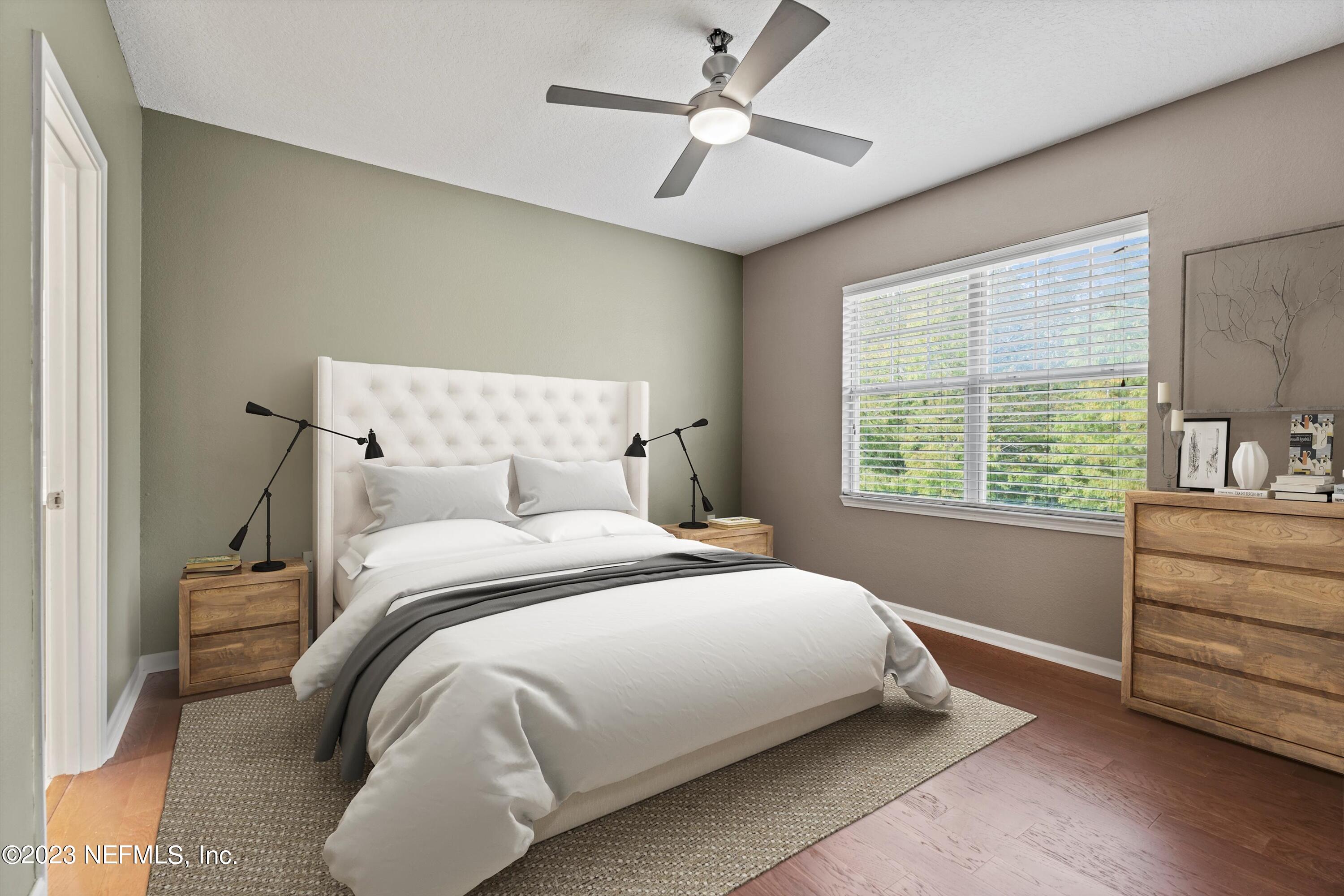 5663 Greenland Road, Unit 1005 Jacksonville, FL 32258 - Photo 20 of 30 a bedroom with a bed and a window