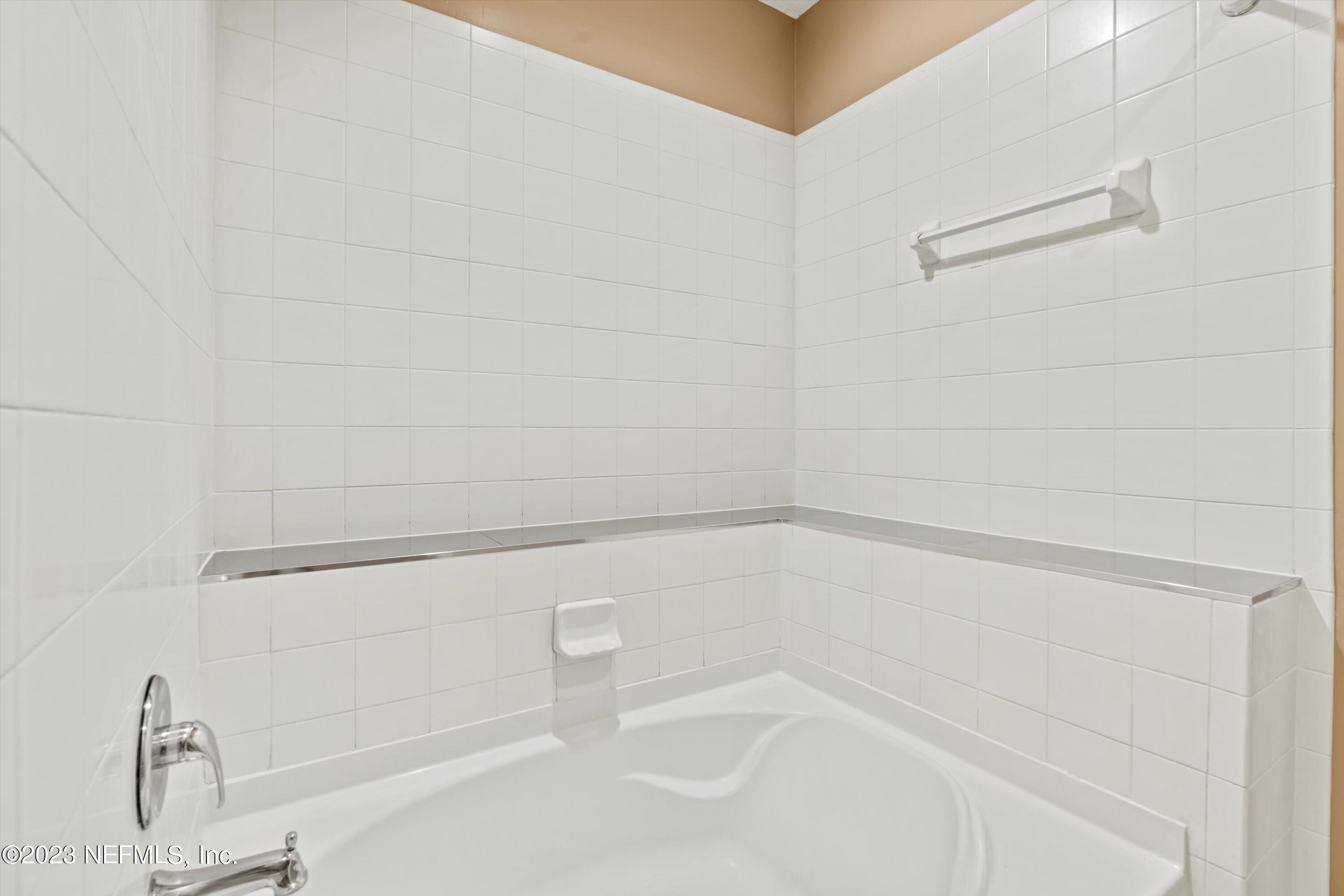5663 Greenland Road, Unit 1005 Jacksonville, FL 32258 - Photo 23 of 30 a close up of a bathtub