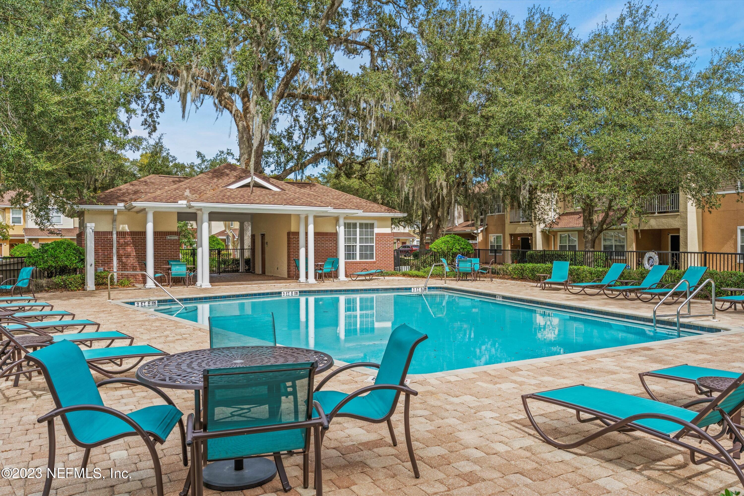 5663 Greenland Road, Unit 1005 Jacksonville, FL 32258 - Photo 6 of 30 a view of a house with backyard and sitting area