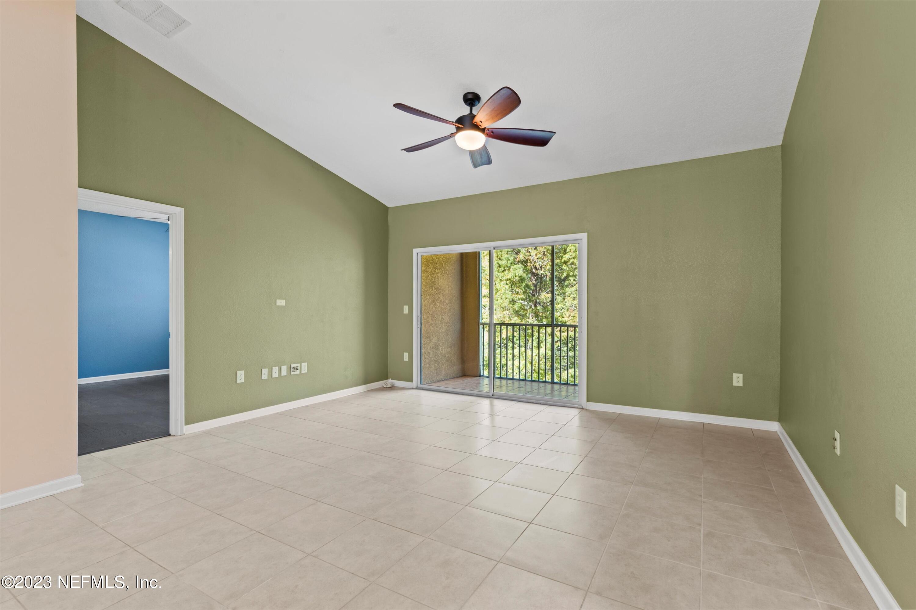 5663 Greenland Road, Unit 1005 Jacksonville, FL 32258 - Photo 8 of 30 a view of an empty room with a window