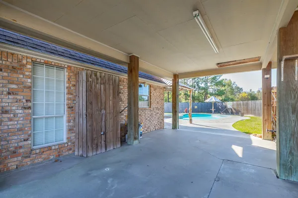 a view of an empty room and a window