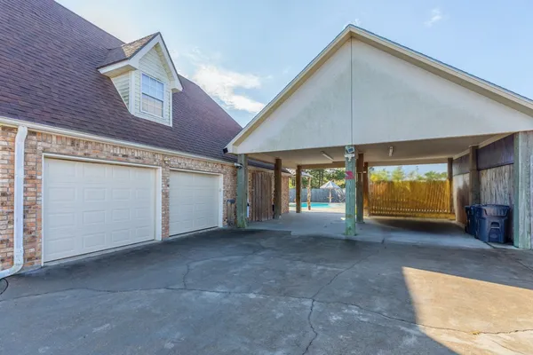 a view of a livingroom with an empty space and a window