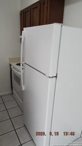 a close view of a refrigerator in kitchen