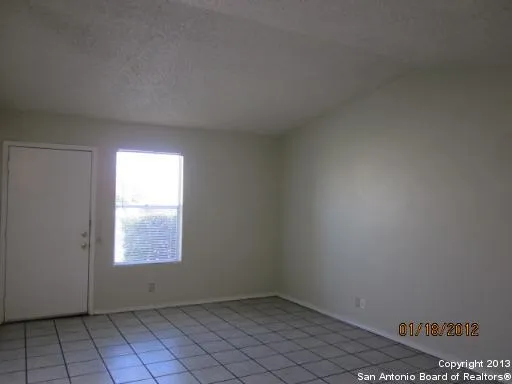 an empty room with a window