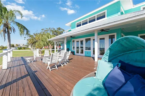 an aerial view of houses with yard