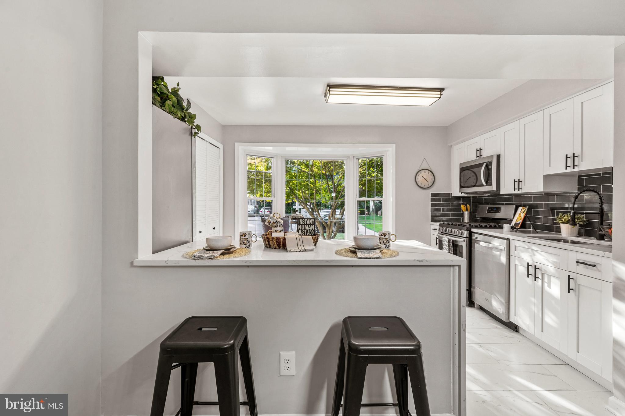 12657 English Orchard Court Silver Spring, MD 20906 - Photo 12 of 48 Counter seating!