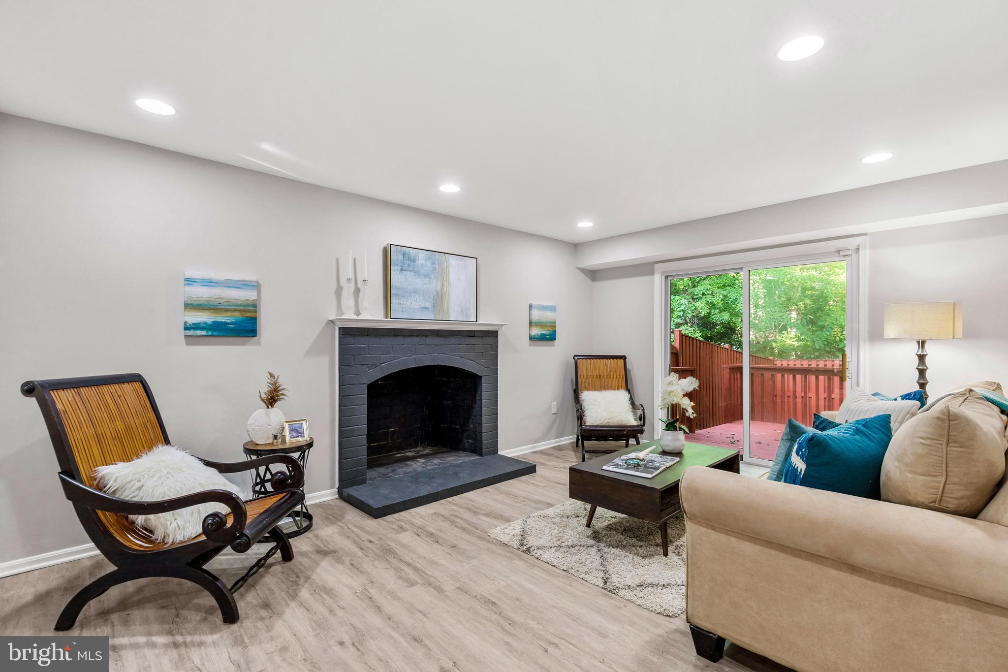 12657 English Orchard Court Silver Spring, MD 20906 - Photo 15 of 48 Large family room with a wood fire place!