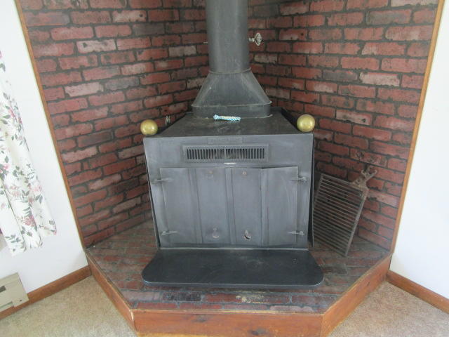 72 Twitchell Road Plymouth, ME 04969 - Photo 6 of 25 Wood Burning Stove in Living Room