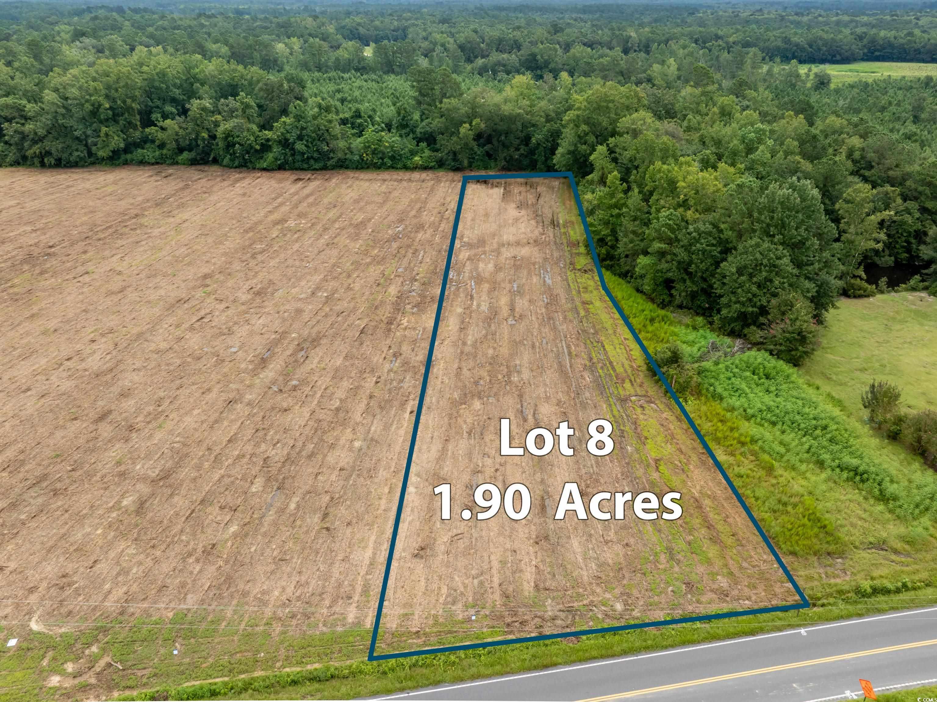 Tbd Lot 8 Tbd Road Nichols, SC 29581 - Photo 1 of 6 View of rural area featuring property parcel outlined and a heavily wooded area