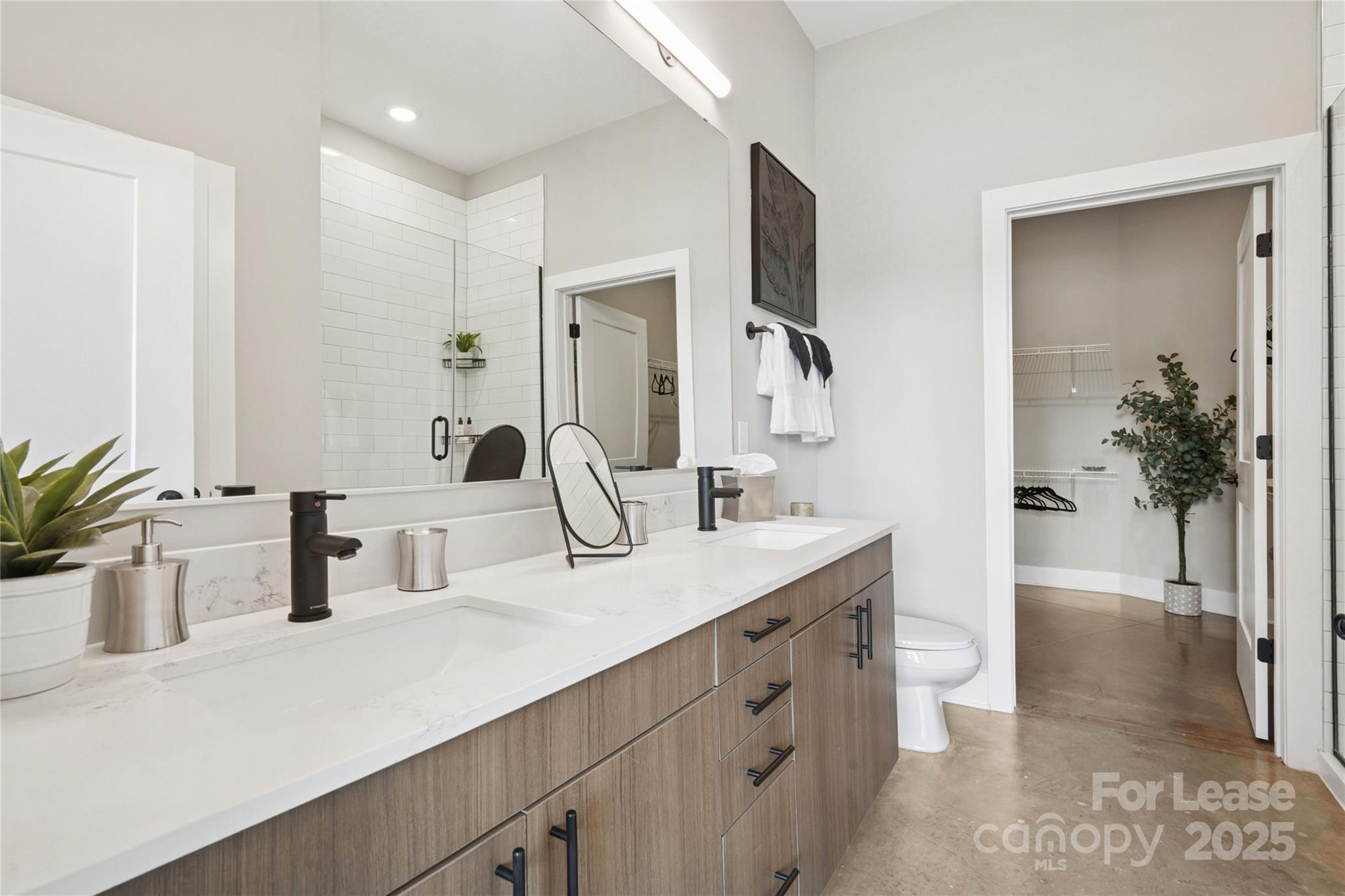 110 Razades Way, Unit B2 Charlotte, NC 28206 - Photo 18 of 29 a bathroom with sink and mirror