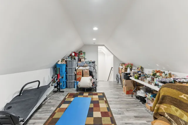 a front view of a house with a garden and porch