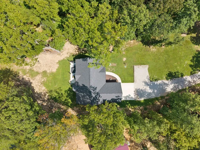 a house view with a garden space