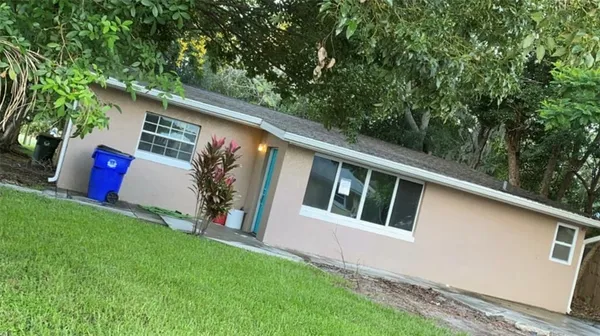 a view of a back yard of the house
