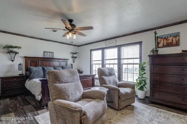 a large kitchen with kitchen island a sink stainless steel appliances and cabinets