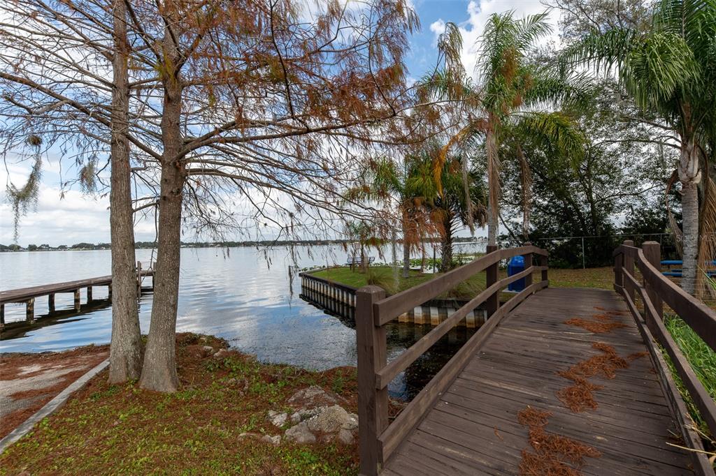 1862 Wind Willow Road Belle Isle, FL 32809 - Photo 30 of 42 a view of a balcony with wooden floor and outdoor seating