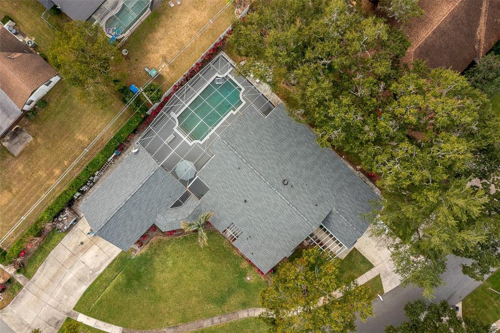 1862 Wind Willow Road Belle Isle, FL 32809 - Photo 34 of 42 an aerial view of a house with a yard and trees