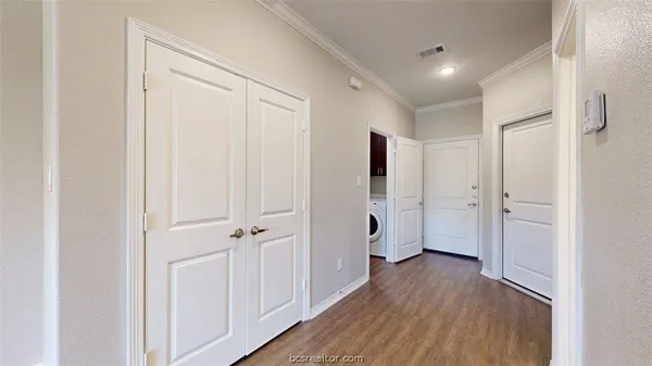 wooden floor with white walls