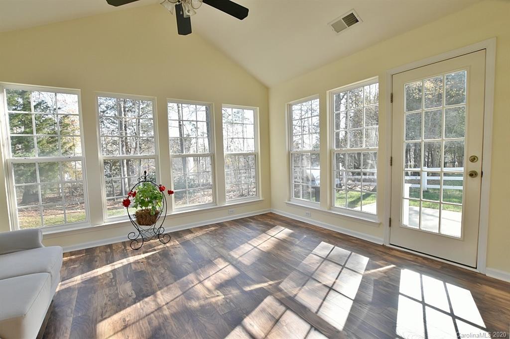 1132 Gower Street Fort Mill, SC 29708 - Photo 14 of 27 a living room filled with furniture and windows