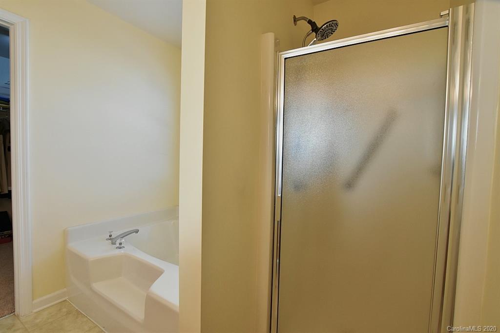 1132 Gower Street Fort Mill, SC 29708 - Photo 17 of 27 a bathroom with a shower and a bath tub