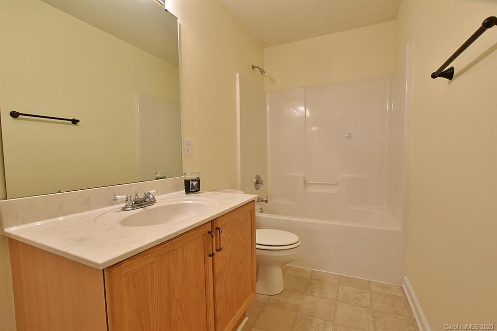 1132 Gower Street Fort Mill, SC 29708 - Photo 20 of 27 a bathroom with a sink a toilet and shower
