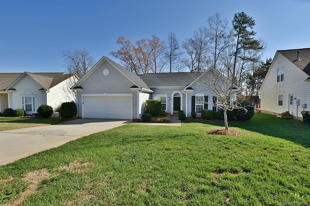 1132 Gower Street Fort Mill, SC 29708 - Photo 27 of 27 a front view of a house with a yard and garage
