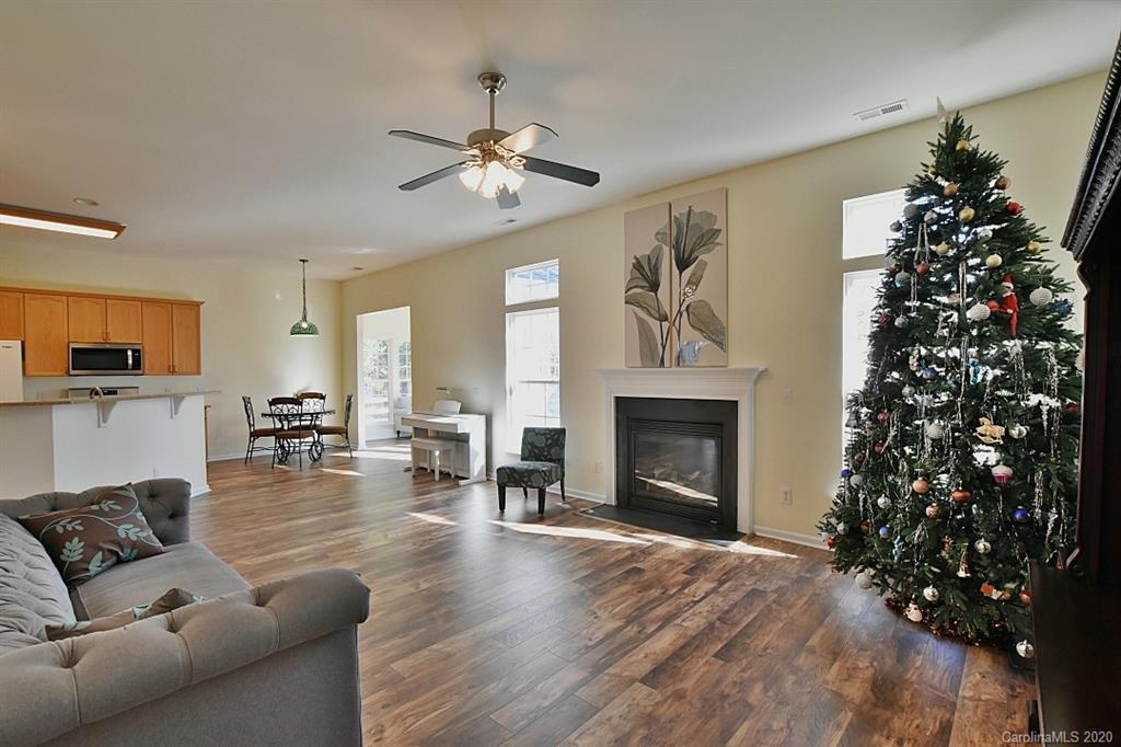 1132 Gower Street Fort Mill, SC 29708 - Photo 7 of 27 a living room with furniture and a fireplace