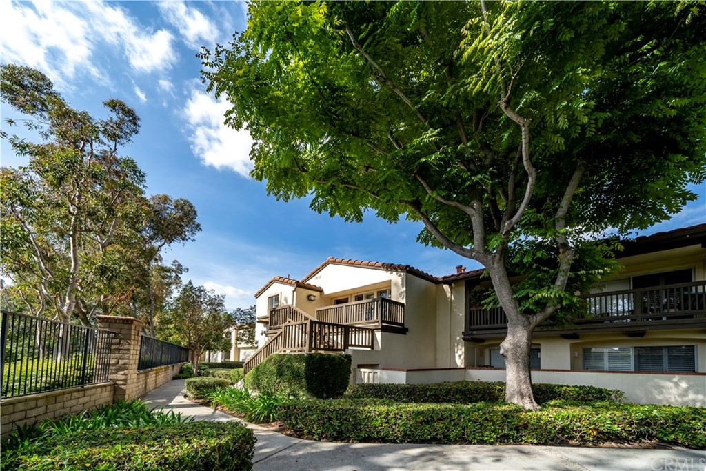 158 South Cross Creek Road, Unit K Orange, CA 92869 - Photo 1 of 1 a front view of a house with a yard