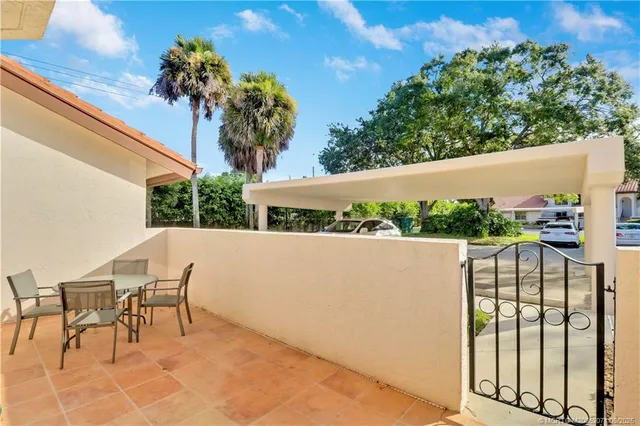 a view of balcony with furniture