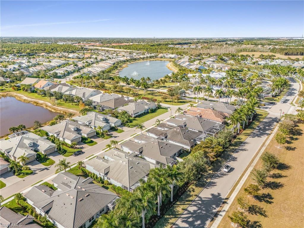 20131 Torch Key Way Estero, FL 33928 - Photo 43 of 47 Aerial perspective of suburban area with a nearby body of water