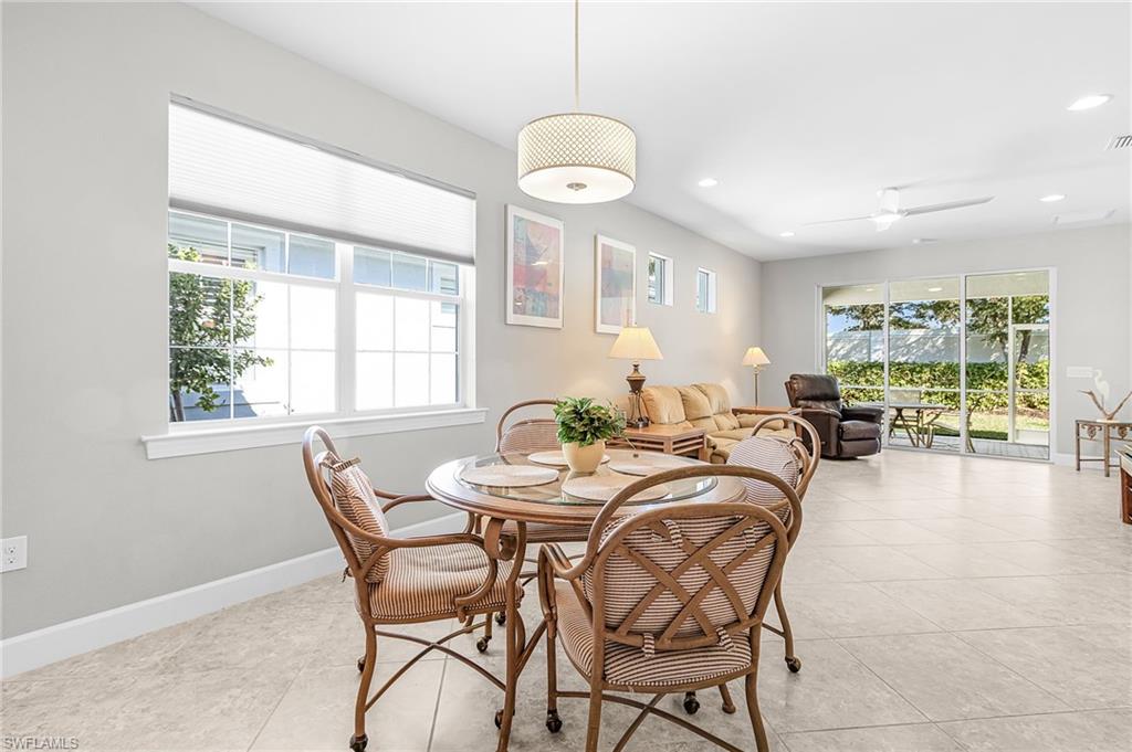 20131 Torch Key Way Estero, FL 33928 - Photo 7 of 47 Dining space with a ceiling fan, recessed lighting, and light tile patterned floors