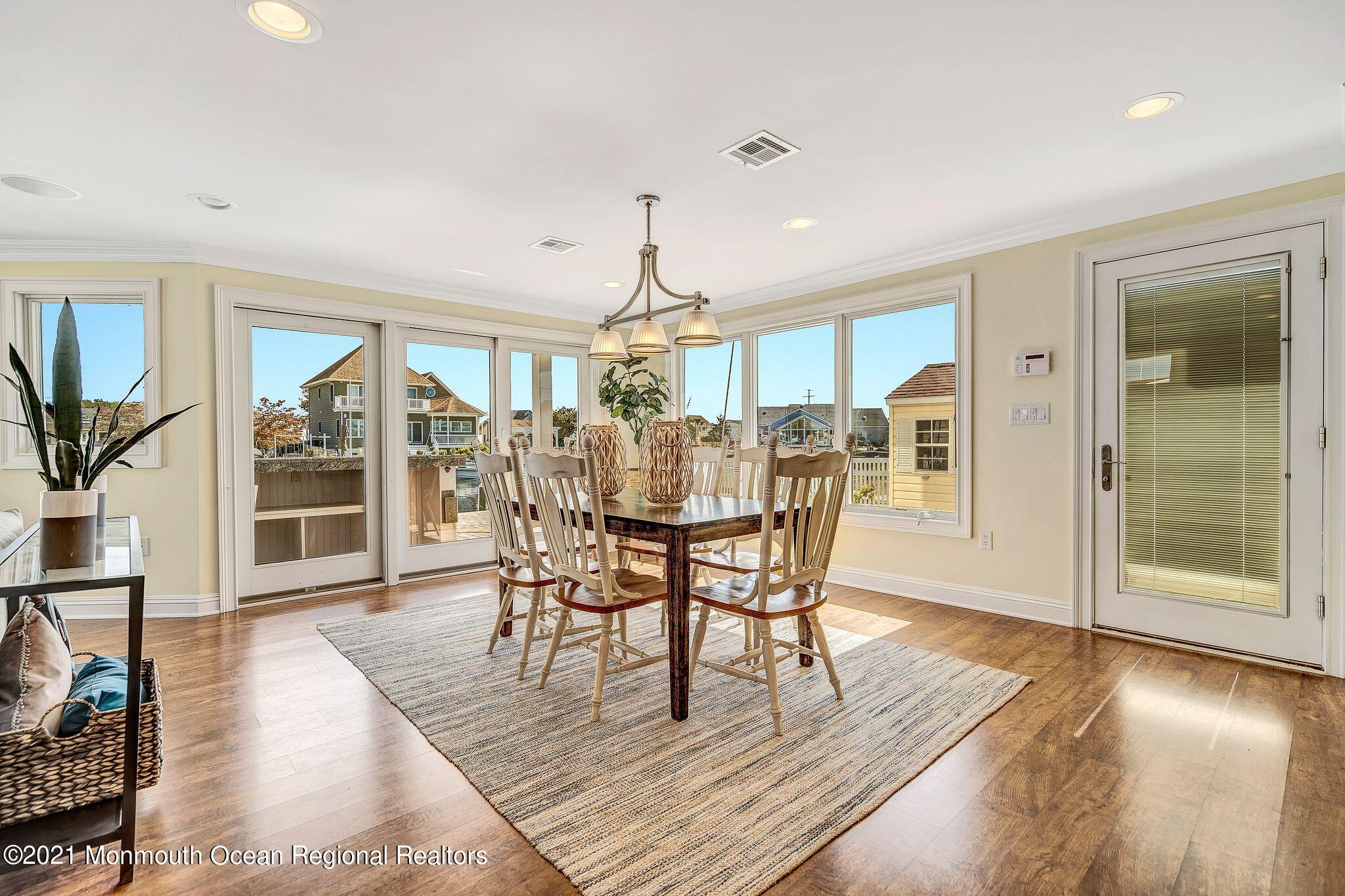 108 Caldwell Road Barnegat, NJ 08005 - Photo 17 of 55 a view of a dining room with furniture and wooden floor