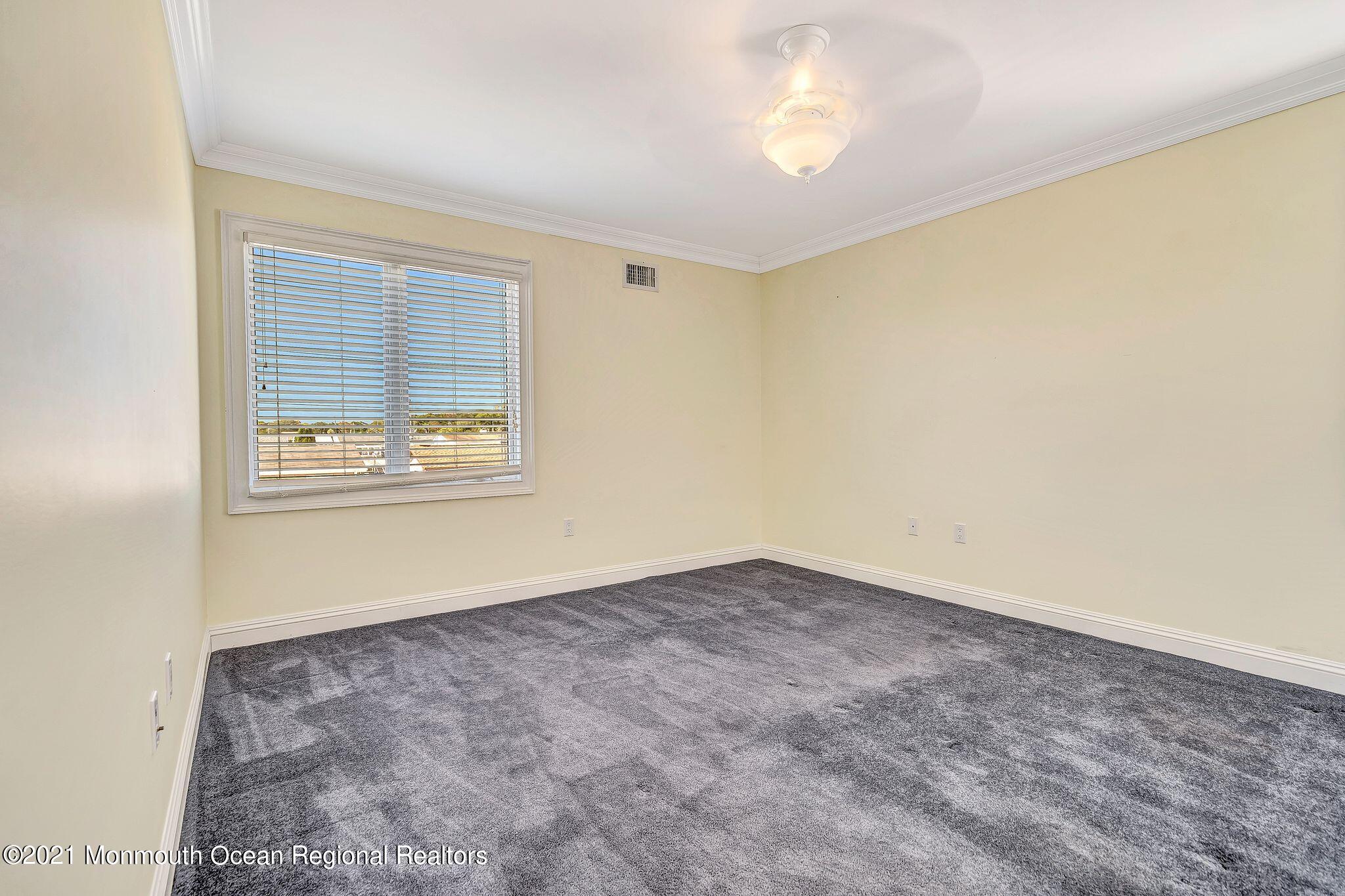 108 Caldwell Road Barnegat, NJ 08005 - Photo 27 of 55 an empty room with a empty space and a window